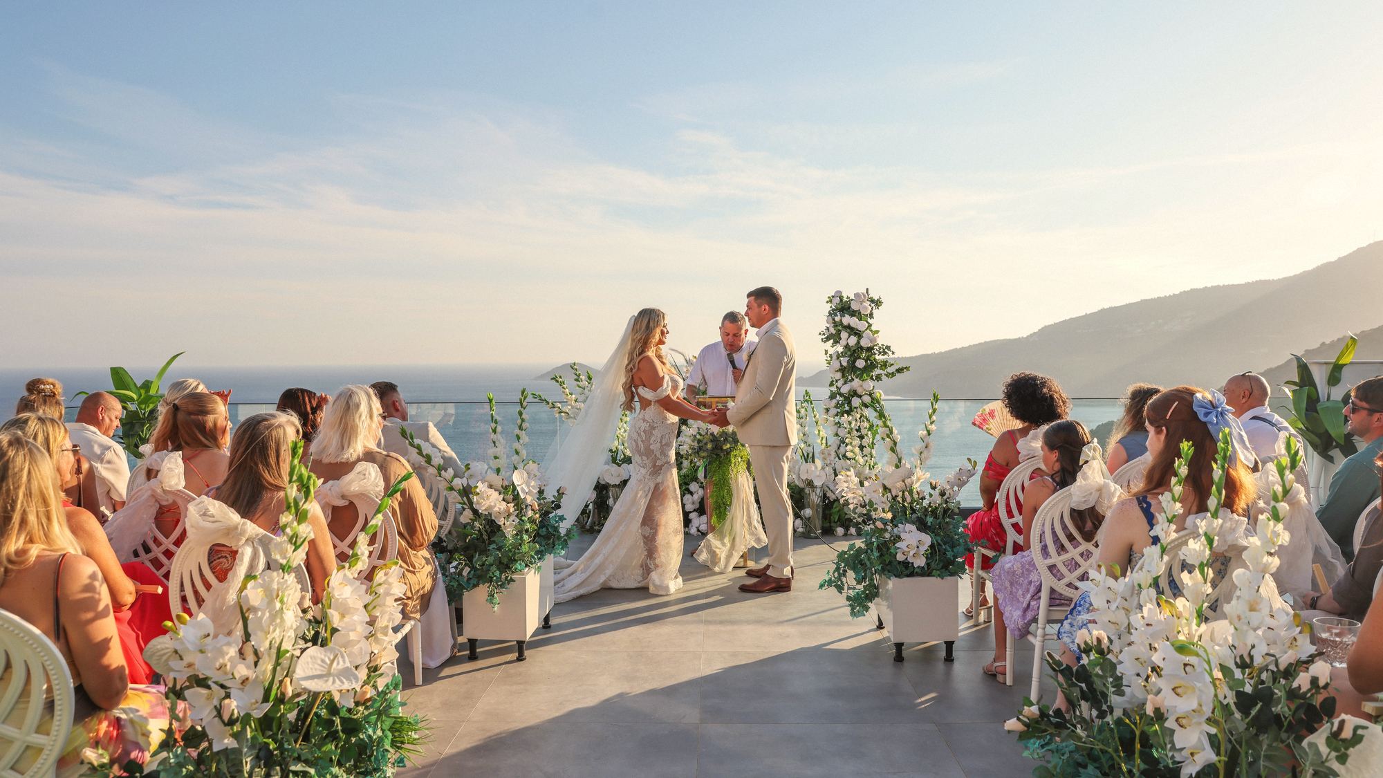 Clifftop ceremony above the Atlantic at golden hour